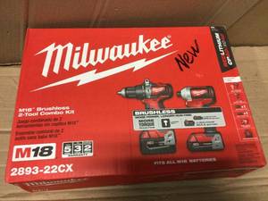 M18 18-Volt Lithium-Ion Brushless Cordless Hammer DrillImpact Combo Kit (2-Tool) with 2 Batteries, Charger and Bag by Milwaukee in good condition
