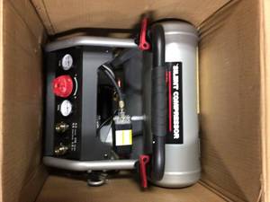 4.5 Gal. Portable Electric-Powered Silent Air Compressor by Husky in good condition