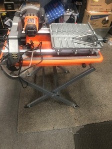 RIDGID 9 Amp Corded 7 in. Wet Tile Saw with Stand In good condition