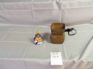 Brown plug in Aroma melt warmer and...