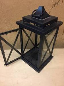 lot 86 image: Metal and Glass Hanging Candle Lantern