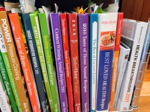 lot 13 image: Rolling Cart Filled with Cookbooks