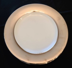 lot 47 image: White With Silver Rims Pottery Barn Plates