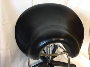 lot 373 image: Saddle Like Rolling Chair