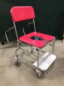 WE CALL THIS THE LITTLE RED TOILET COMMODE WITH ATTITUDE COMES WITH REALLY RED BACK REST AND CUSHION - RETRACTION FOOTREST AND SWING AROUND ARM RESTS - NICE CONDITION - SEAT HAS A MELT SPOT BUT NO HOLES OR TEARS&nbsp&nbsp