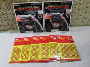 lot 86 image: (RMDR) 2 Super Cap Guns and 6 Packs...