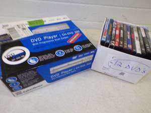 lot 30 image: DVD Player unopened with 12 DVDs
