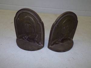 lot 100 image: 2 Cast Iron Rare Charles Lindbergh Book Ends