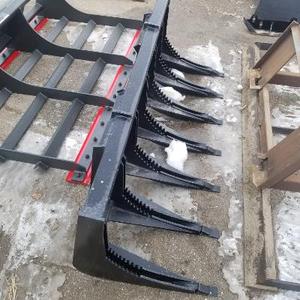 lot 16 image: Brand New Universal Mount Bobcat Skid Loader Skid Steer 72 RootRake Attachment