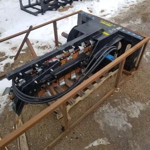 lot 14 image: Brand New Universal Mount Bobcat Skid Loader Skid Steer Hydraulic Trencher Attachment