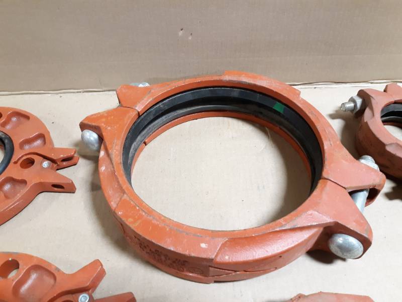 (5) Victaulic  Gruvlok Pipe Clamps and Adapter