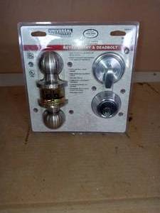 lot 4 image: Standard Duty Commercial Satin Chrome Keyed Entry Knob with Single Cylinder Deadbolt Combo by Universal Hardware- not used