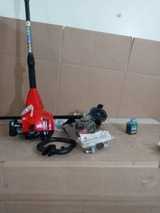lot 15 image: 2-Cycle 26 CC Straight Shaft Gas Trimmer by Homelite- open box not used