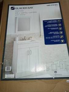 lot 37 image: Penford 24 in. Bathroom Vanity in Cultured Marble Vanity Top in White with White Sink and Mirror by Glacier Bay- open box not used