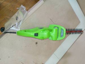 lot 2 image: Greenworks 18-Inch 2.7 Amp Corded Hedge Trimmer 22102- no packaging no battery included