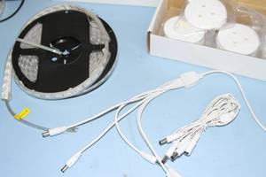 lot 15 image: LED Lighting Lot Includes Ribbon & Puck LED Lights Power Supplies & More