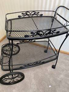 lot 19 image: Cast Iron Rolling Display Cart