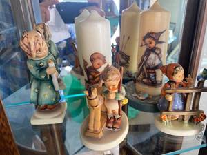 lot 25 image: Three Hummel Figurines & Two Pillar Candles