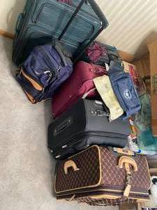 lot 48 image: Suitcases For the Whole Family