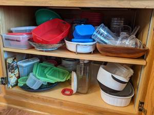 lot 251 image: Cupboard Filled with Tupperware, Bowls, Serving Dishes, etc.