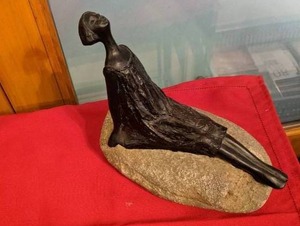 lot 316 image: Woman Sunbathing on Rock Figurine