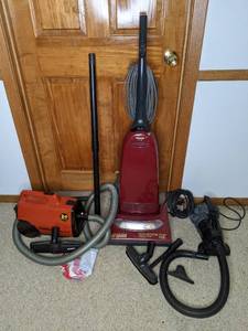 lot 612 image: Three Vaccuum Cleaners - Upright, Canister, and Handheld