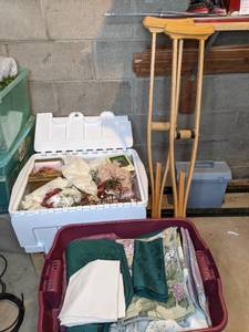 lot 653 image: Totes of Christmas Decorations and Pair of Crutches