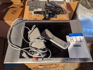 lot 811 image: Sharp Television w Remote