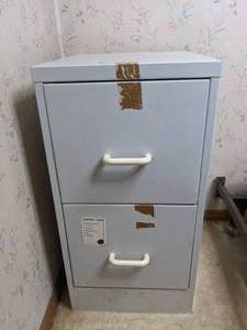 lot 724 image: Light Blue Metal File Cabinet