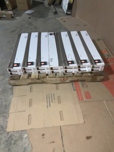 lot 29 image: 14 CASES WITH TRAFFICMASTER WALNUT EMBER JAVA 6 IN. x 36 IN. VINYL PEEL AND STICK VINYL PLANK (36 SQ. FT CASE) NOT USED SEE PICS