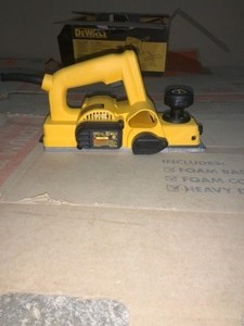 lot 49 image: DEWALT 5.5 Amp Corded 3-14 in. Portable Hand Planer SEE PICS