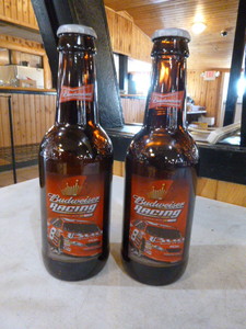 lot 85 image: 2 Budweiser Racing Bottles