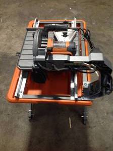 Ridgid 9 Amp Corded 7 in. Wet Tile Saw with Stand not used
