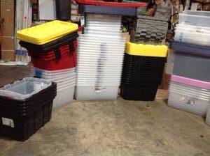 lot 15 image: Pallet with assorted Plastic Storage bins some missing covers see pictures