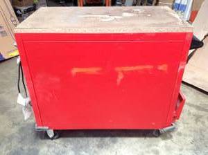 lot 16 image: Milwaukee 40 in. W x 22.1 in. D 6-Drawer Mobile Workbench with Stainless Steel Top schratches present see pictures