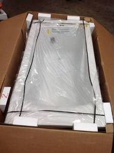 lot 32 image: American Std Evolution 60 in. x 32 in. Acrylic Reversible Drain Bathtub in White not used open box see pictures