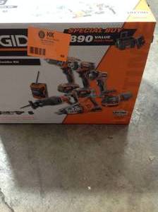 lot 40 image: Ridgid 18V Cordless Combo Kit (7-Tool) with Rolling Keter Case, (3) 2.0 Ah Batteries and Charger see pictures
