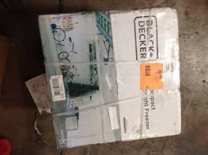 lot 42 image: Black and Decker 1.2 cu. ft. Compact Upright Freezer see pictures