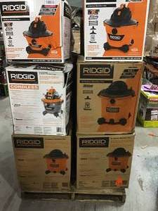 Pallet with assorted Ridgid WetDry vacs open boxes various models and conditions see pictures