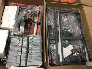 Pallet with 4 Ridgid 7 in Tile saws with stands open boxes see pictures