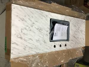 Kohler Vanity cabinet and top see pictures