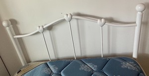 lot 115 image: Twin Bed with White Metal Headboard
