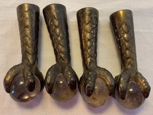 lot 36 image: Four Piece Claw Feet w Glass Balls