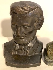 lot 53 image: Metal Bust on Marble Stand and Lincoln Iron Bookend