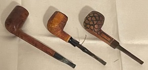 lot 297 image: 12 Pipes and and an American Cigar Mold