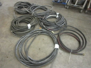 lot 160 image: BLACK HOSES-SOME WITH DELUXE NOZZLES AND FITTINGS