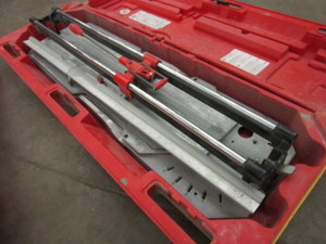 lot 201 image: RUBI TILE SAW WITH CASE