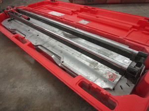 lot 202 image: RUBI TILE SAW WITH CASE