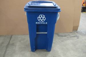 lot 77 image: Toter 32 Gal. Blue Rollout Recycling Container with Attached Lid