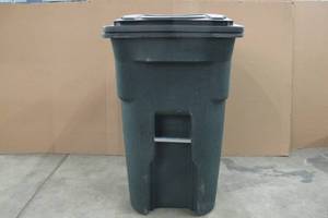 lot 81 image: Toter 64 Gal. Greenstone Trash Can with Wheels and Attached Lid